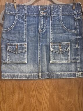 Old Navy Blue Denim Mini Skirt with Front Flap Pockets.  Box 46